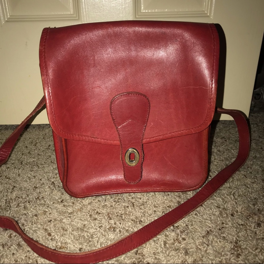 USED red leather purse.